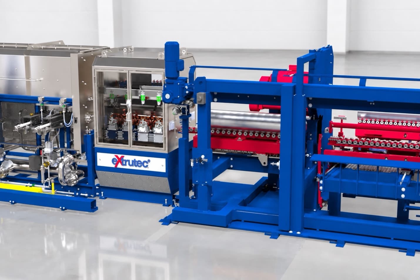 Extrutec billet heating line in blue and stainless-steel livery on a factory floor.